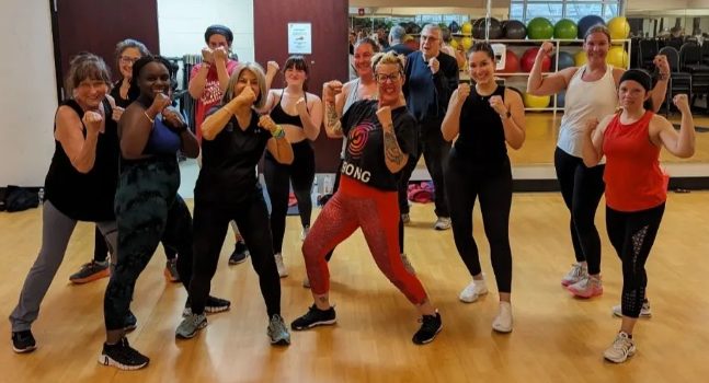 strong nation class members in kickboxing poses